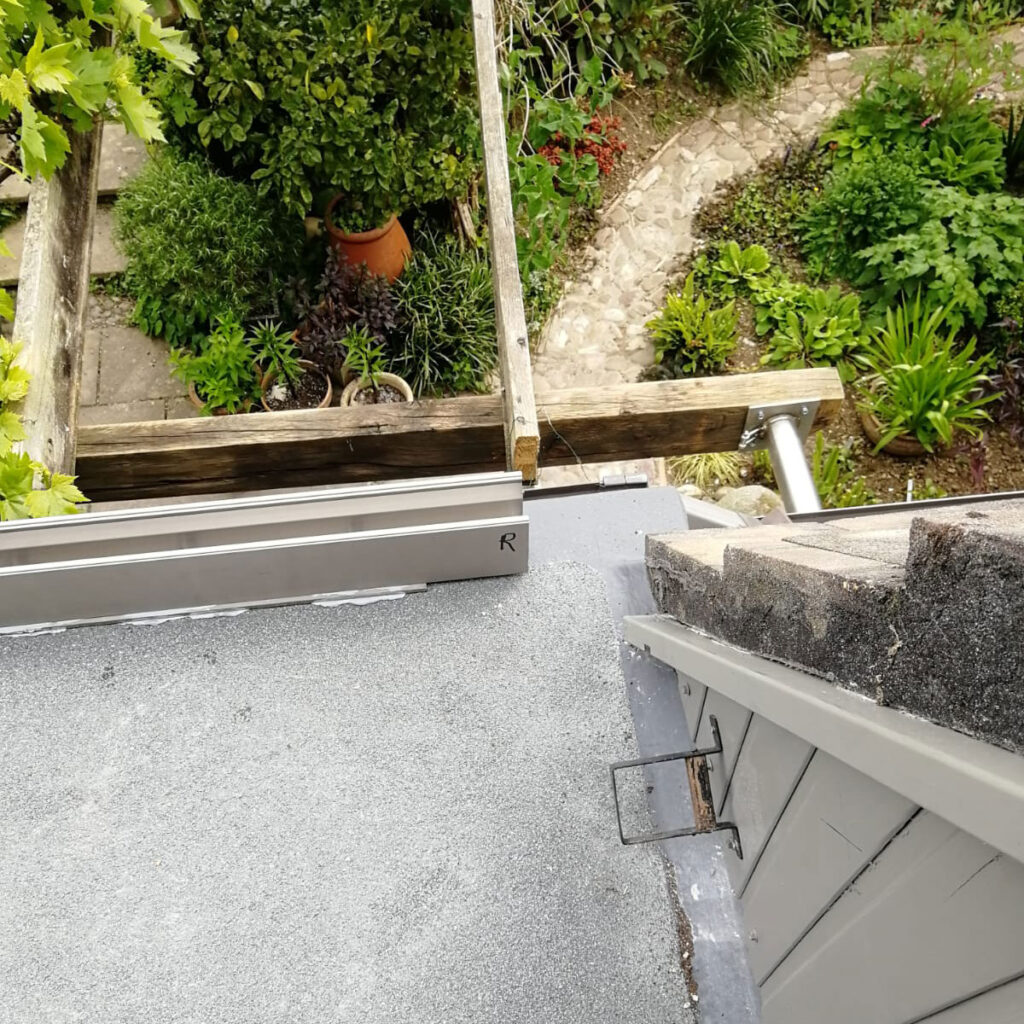 Installation process showing the watertight stanchion mount by Stainless Fabs in Plymouth